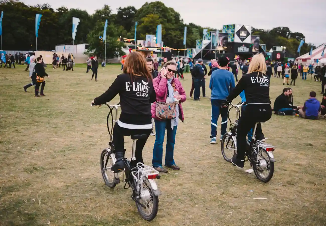 E-Lites Brand Activation Festivals people on bikes on a field