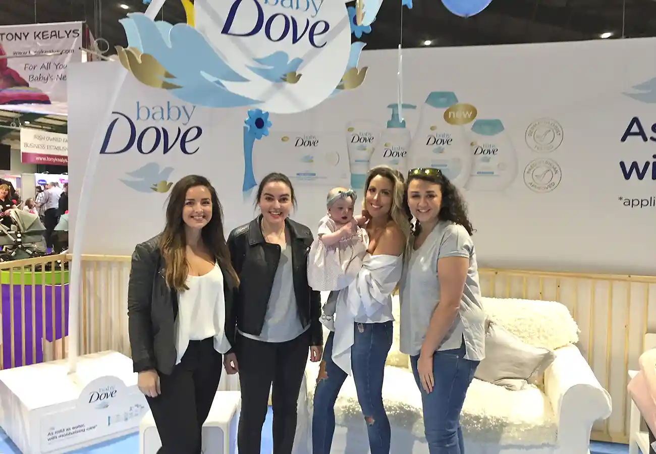 Baby Dove tradeshow moms group picture