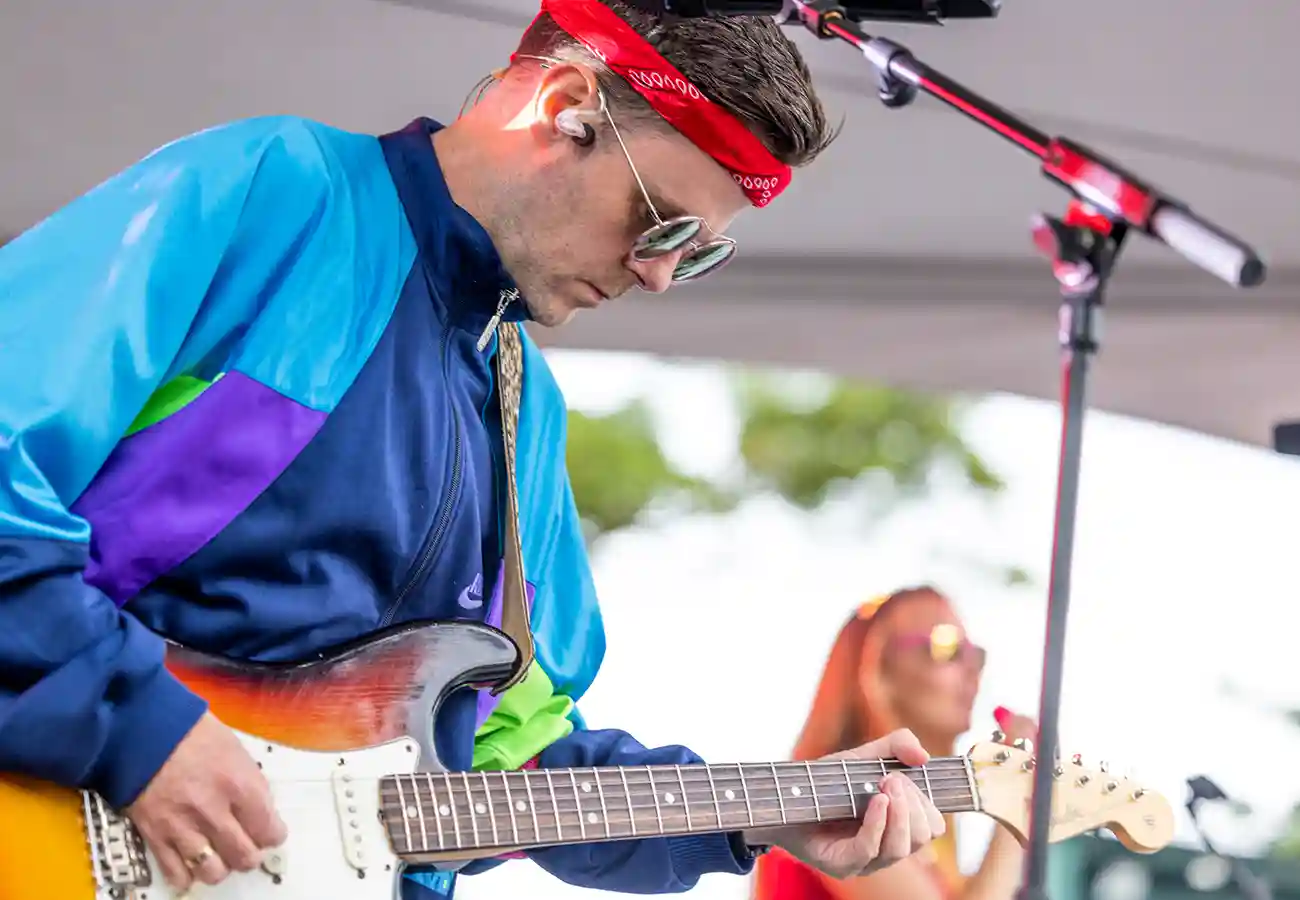 Musician playing guitar at SAP 25 Anniversary Galway