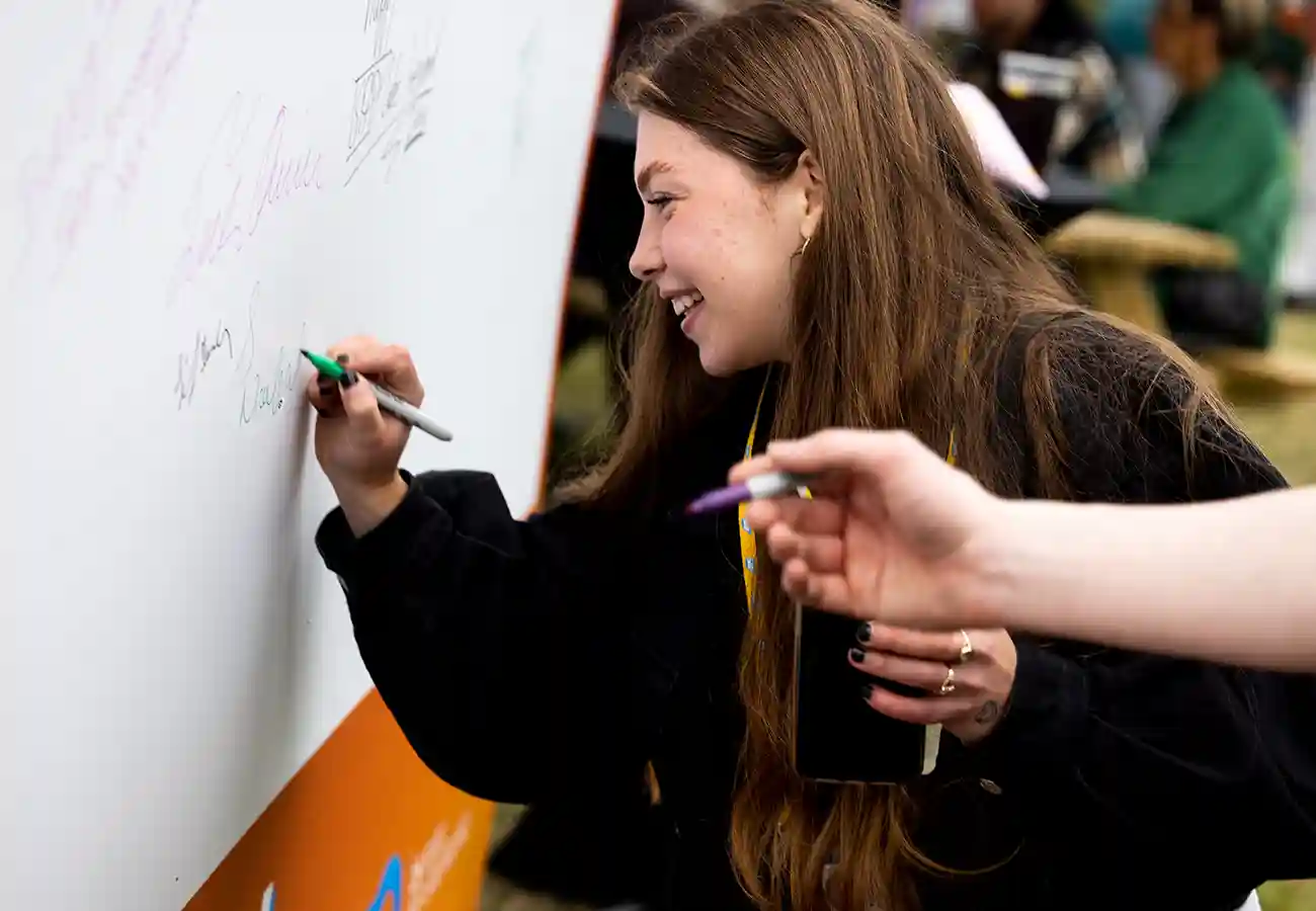 Writing on board at SAP 25 Anniversary Galway